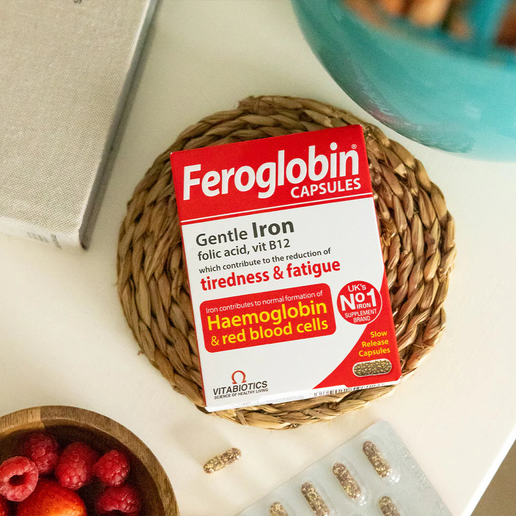 Vitabiotics Feroglobin Capsules gentle iron supplement with folic acid and vitamin B12, product box with capsules in a lifestyle setting, available at docxora.com Pakistan
